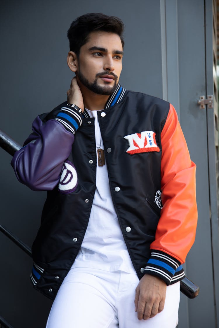 Bearded Man Wearing Varsity Jacket