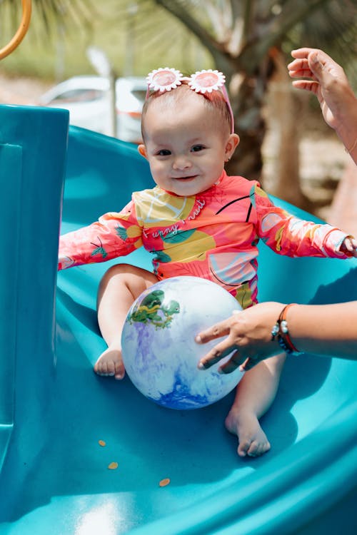 A Cute Baby on a Slide