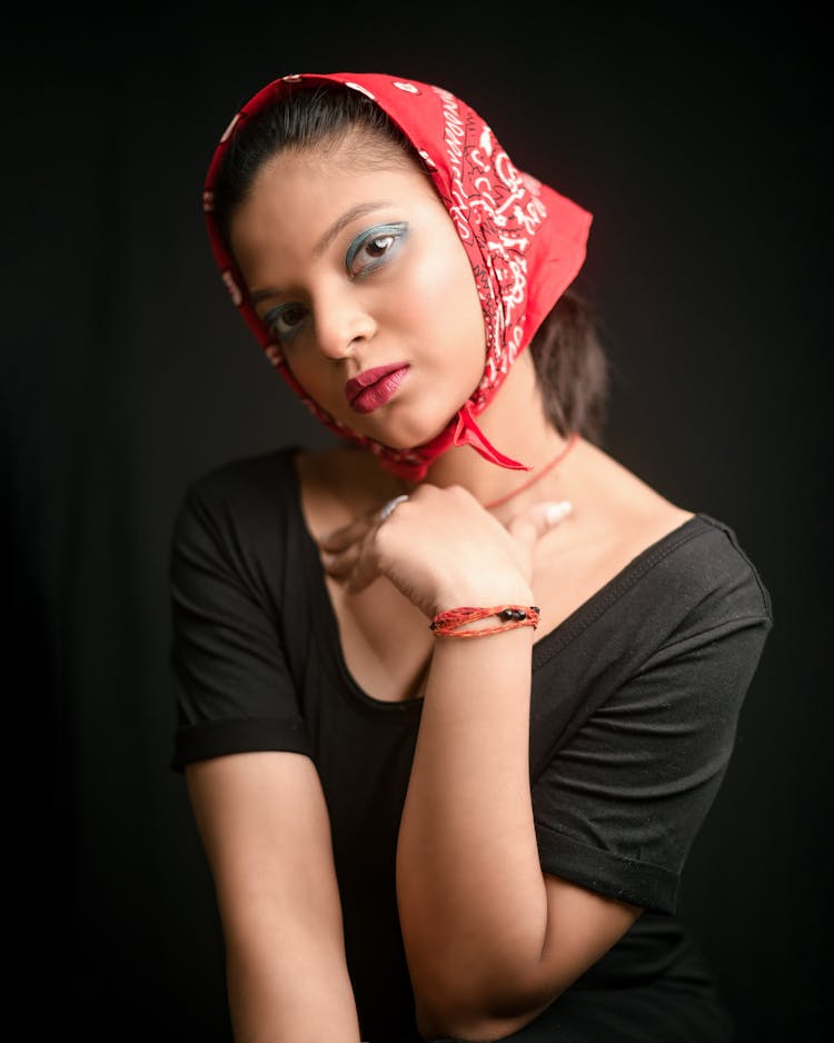 Studio Portrait Of A Young Woman Wearing A Headscarf