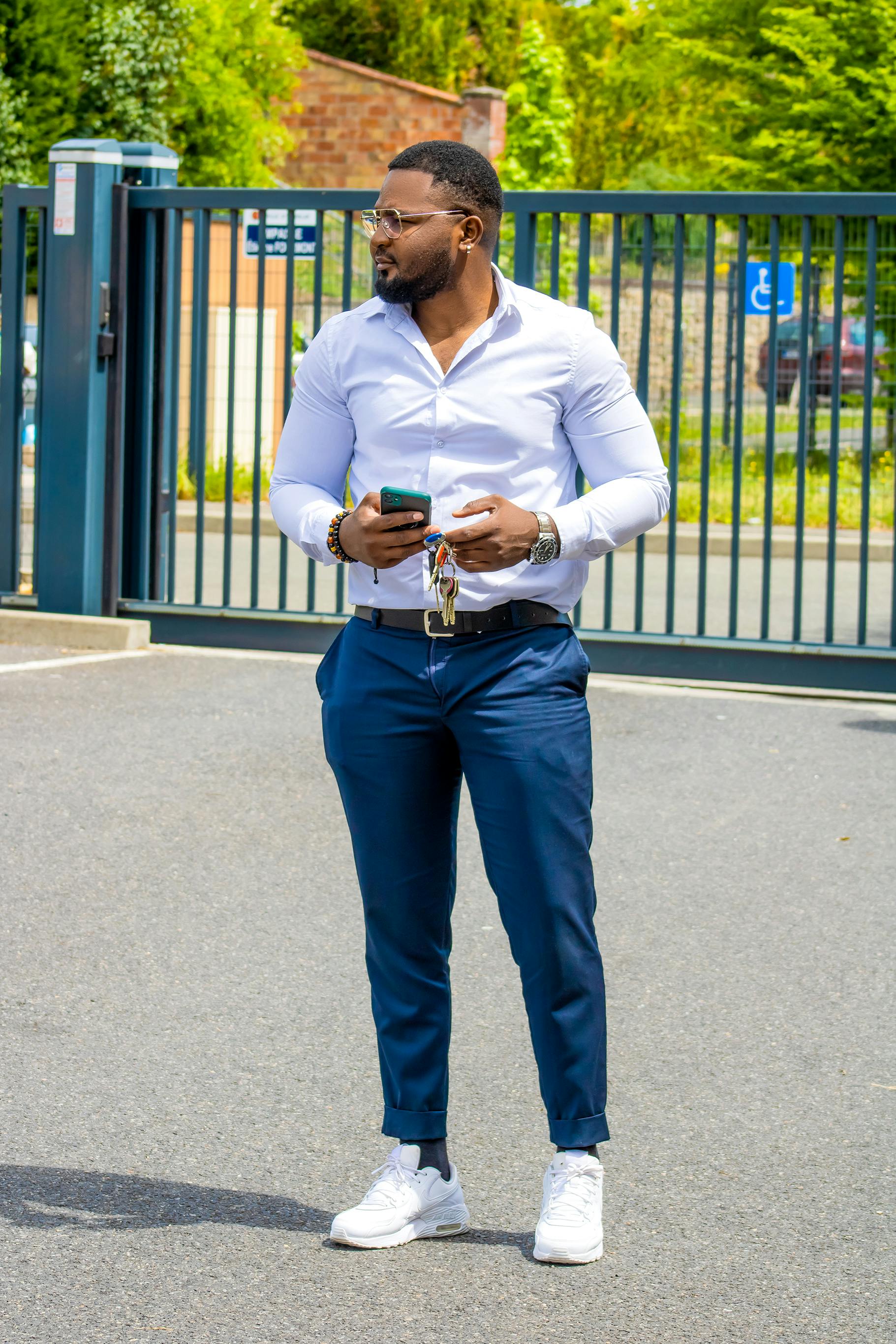 Man in White Dress Shirt Holding Suit Jacket · Free Stock Photo