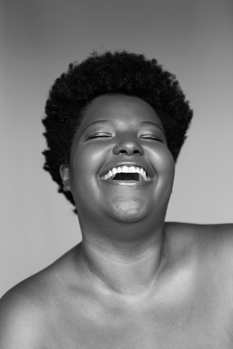 Black And White Portrait Of Laughing Woman