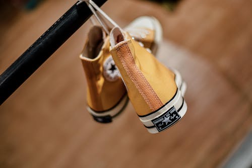 Yellow and White Converse All Star Sneakers