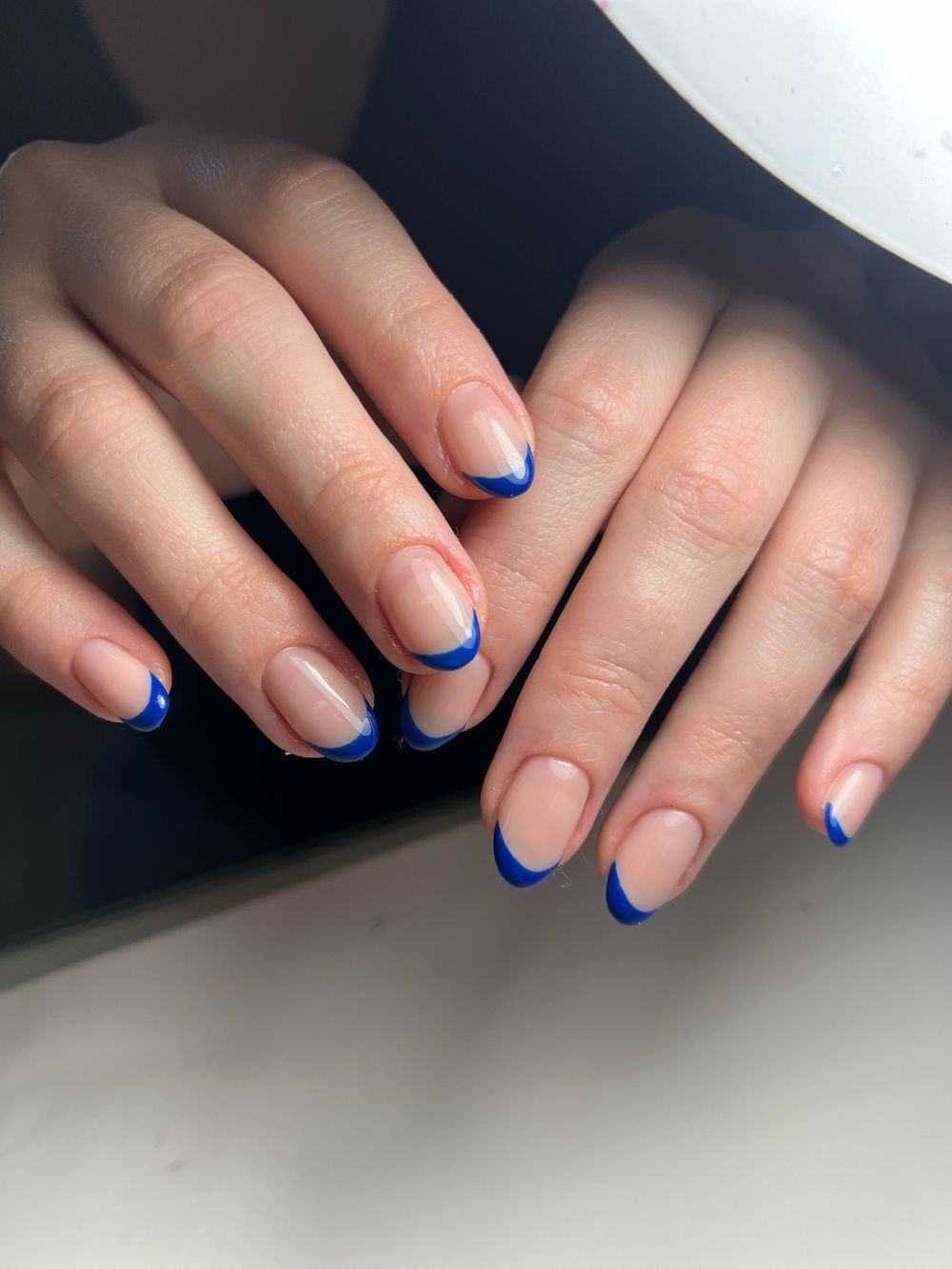 Blue French tip manicure