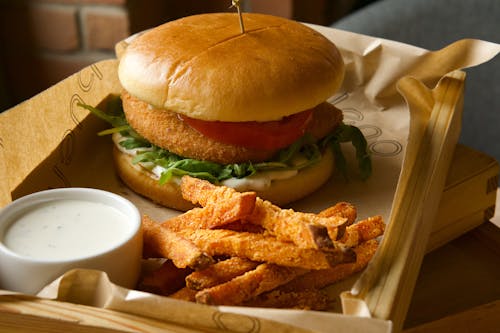 Free Burger With Fries on a Wooden Tray Stock Photo