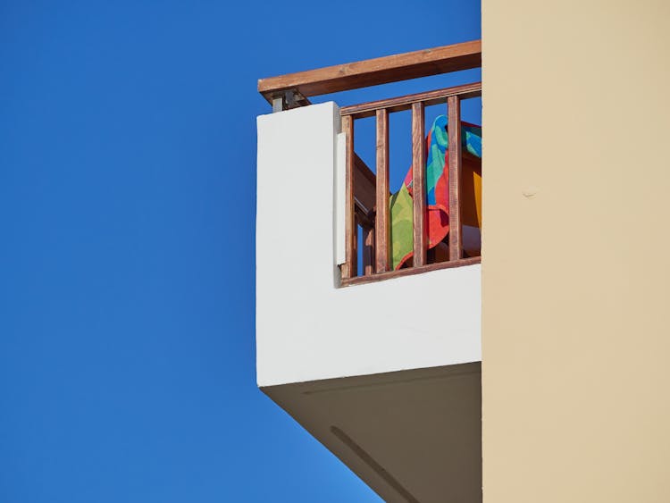 Building Balcony On Blue Sky