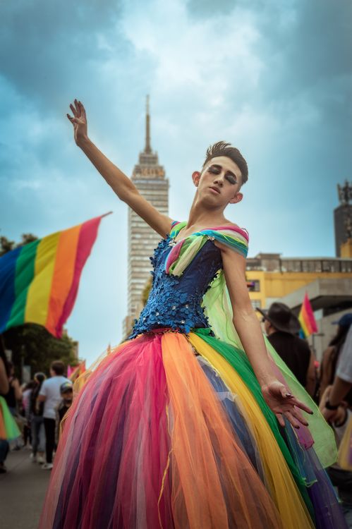 Person Solid Color A Person Wearing Colorful Gown · Free Stock Photo