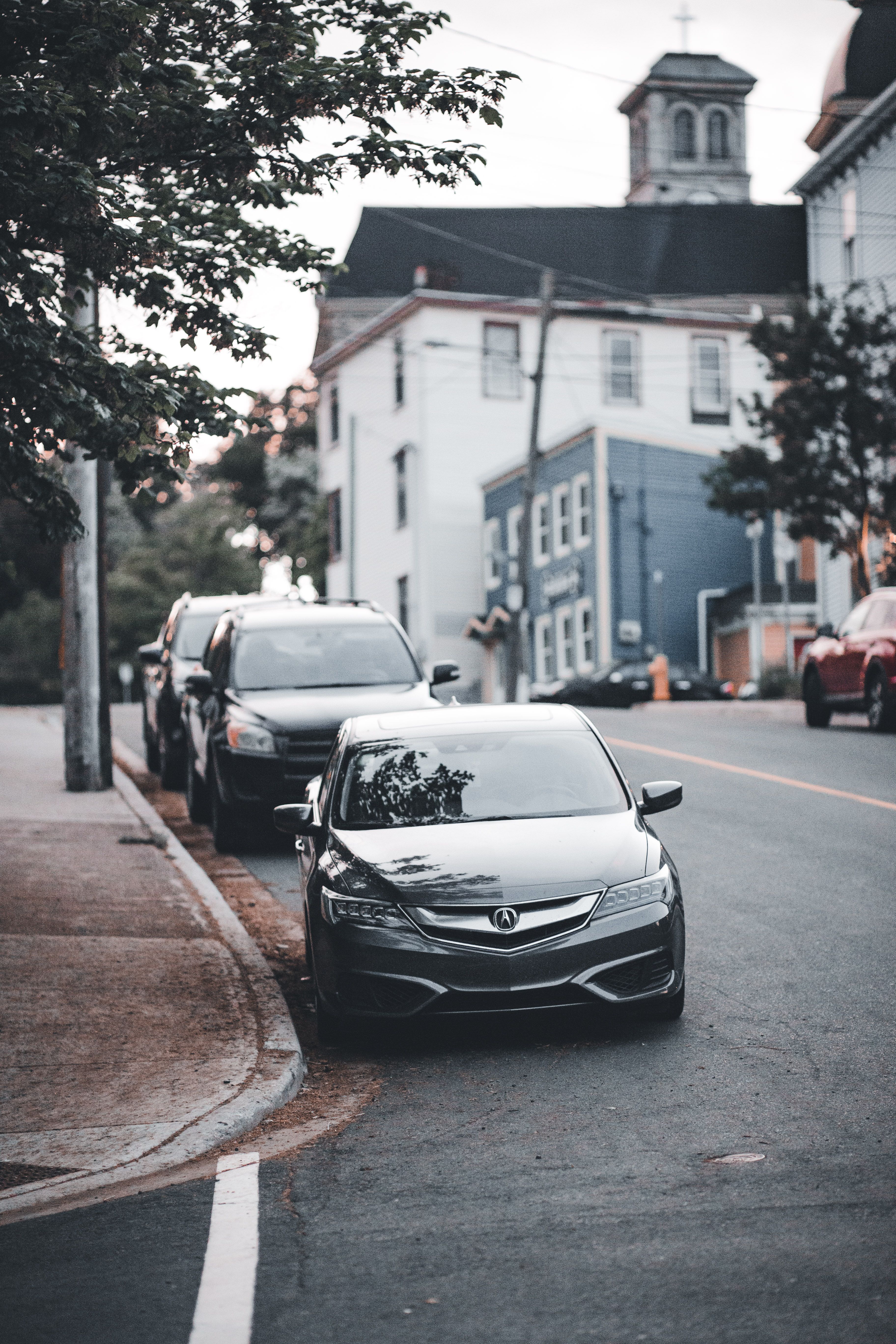 Cars Parked on the Side of a Street in City · Free Stock Photo