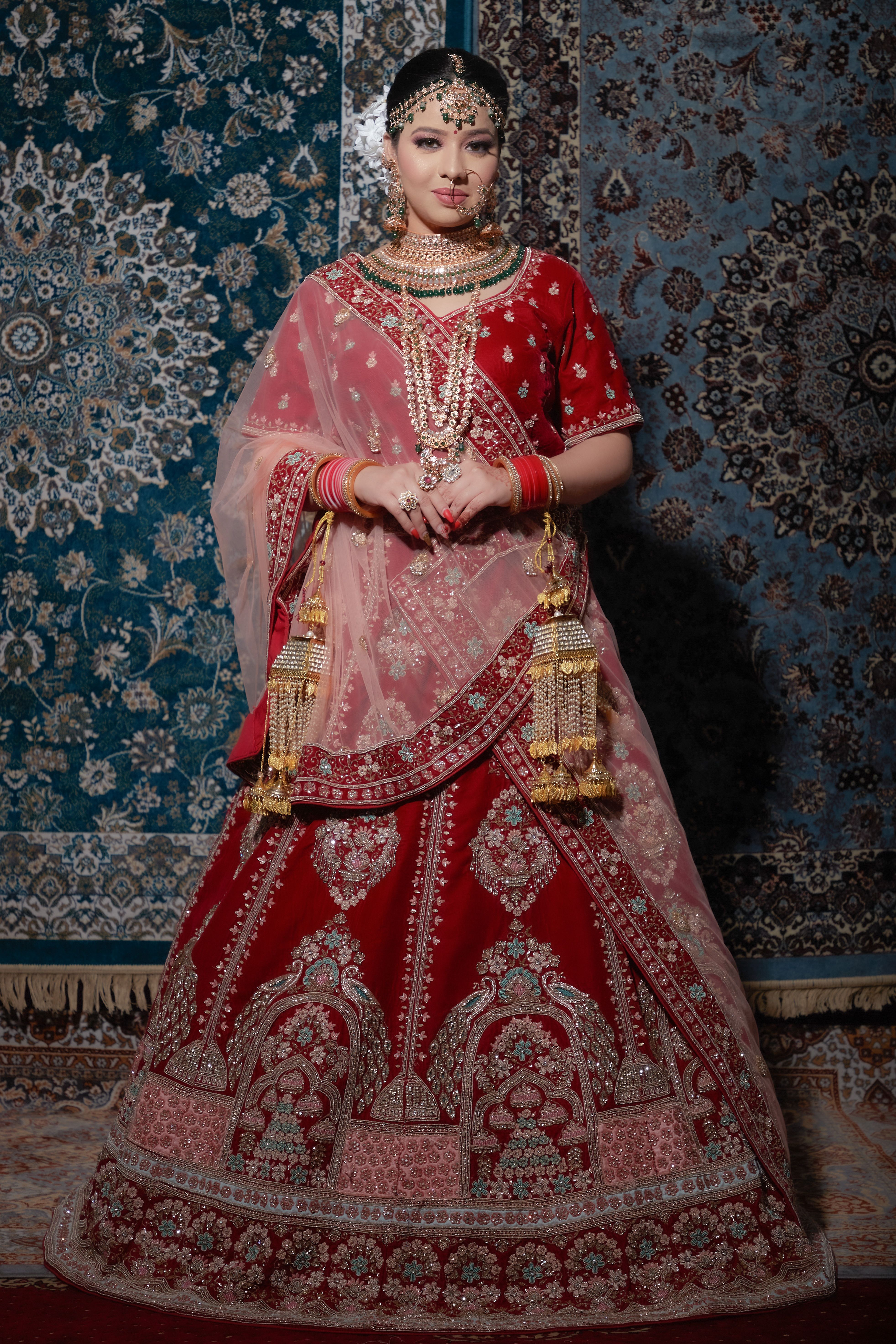 A Woman in Red and Gold Sari Dress · Free Stock Photo