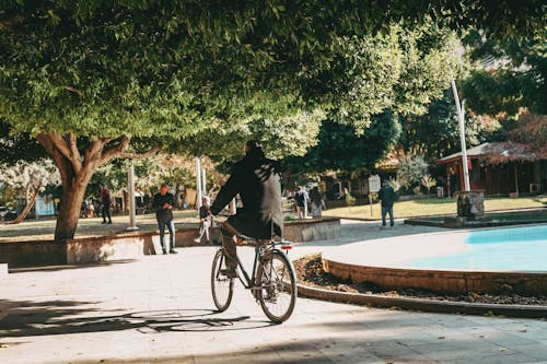 Man Riding a Bike at the Park
