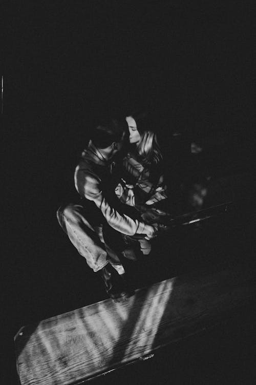 Black and White Photo of a Kissing Couple