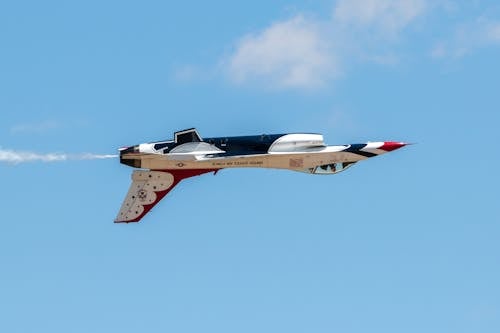 Free White and Red Jet Plane in Mid Air Stock Photo