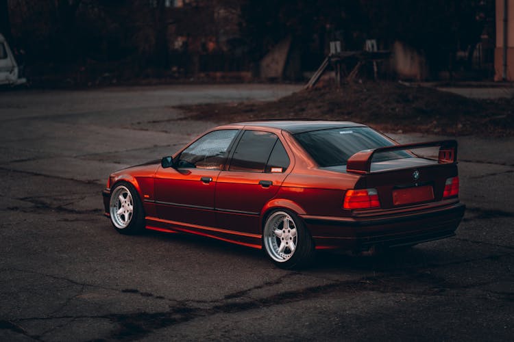 Photo Of A Red Metallic Tuning Car