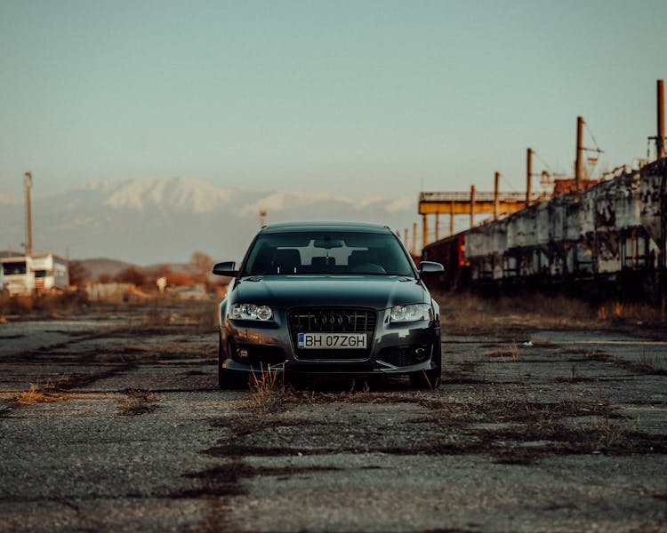 Audi A3 Parked On Unpaved Road