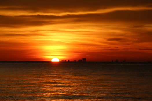 Breathtaking sunset over the ocean in Malaysia with vibrant colors and serene sea view.