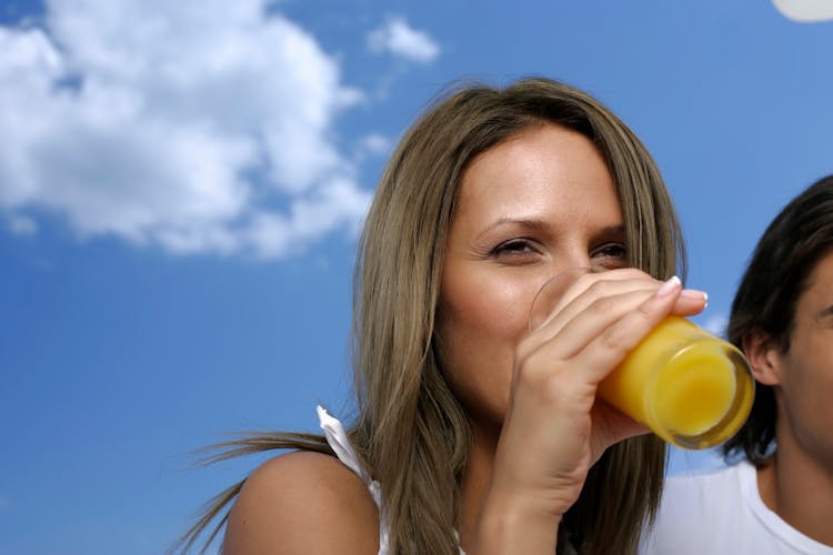 Woman Drinking Juice