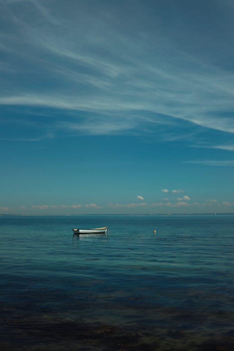 Empty Boat On Sea