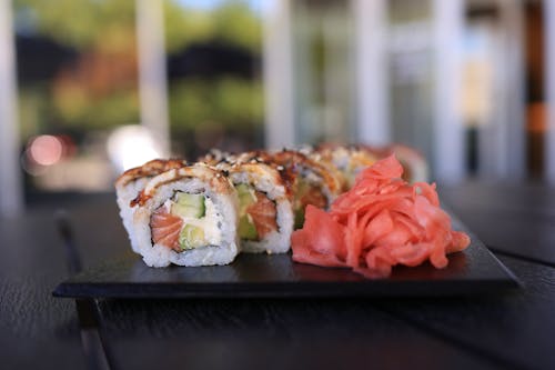 Sushi Rolls on Black Plate