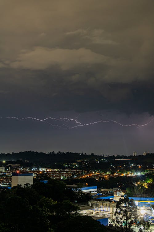 Photo of a Lightning at Night over the City