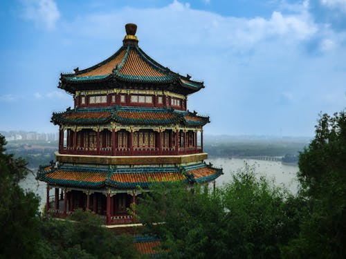 Colorful Chinese Building Near Green Trees 