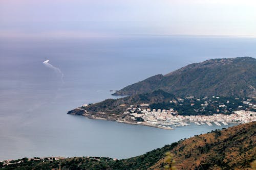 High Angle View of City on the Coastline and Mountains 