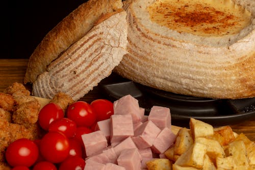 Bread With Cheese on Black Plate