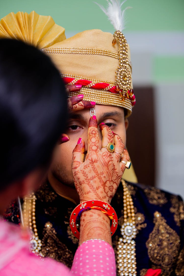 Putting A Tilak A Man On Forehead