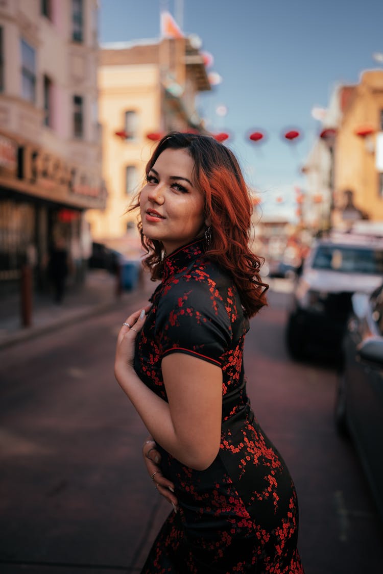 Woman In Tight Fitting Dress On Stre