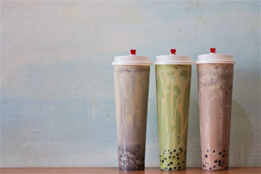 Three bubble tea flavours in sealed cups, photo by Telly Mina on Pexels