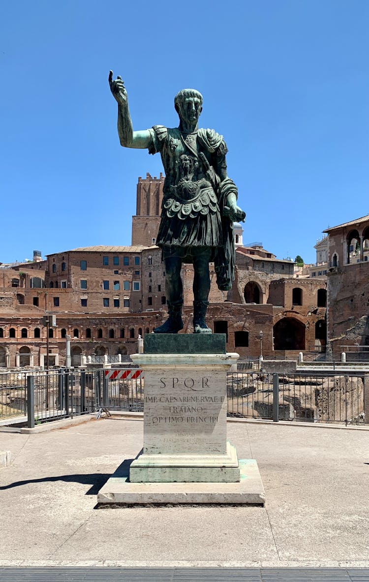 Statue Of Caesar In Front Of Forum Romanum In Rome, Italy