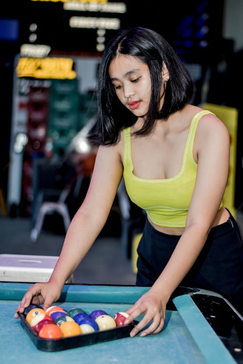 Woman Arranging Snooker Balls 