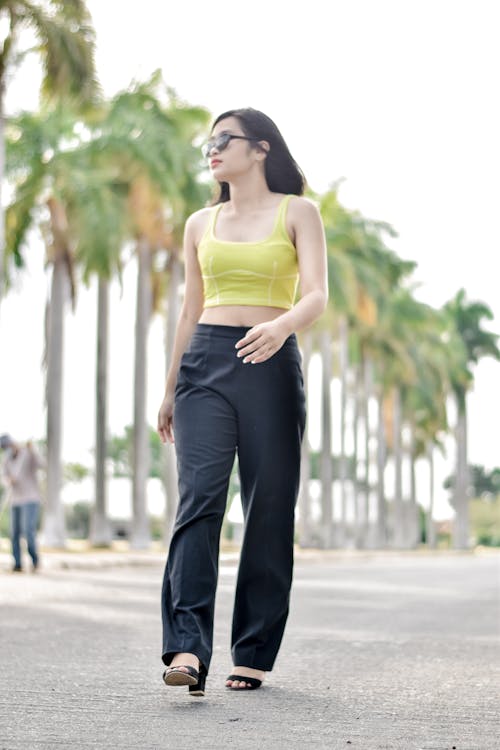 Woman in Pants and Tank Top