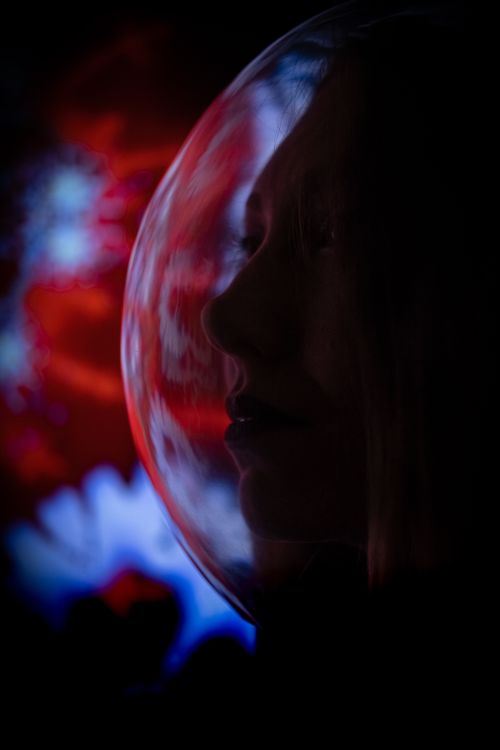 Free A captivating surreal portrait of a woman with an ethereal aura, blending fantasy and mystery. Stock Photo