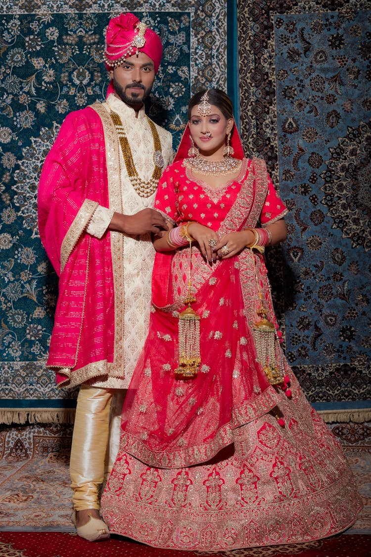 Couple In Traditional Wedding Costumes