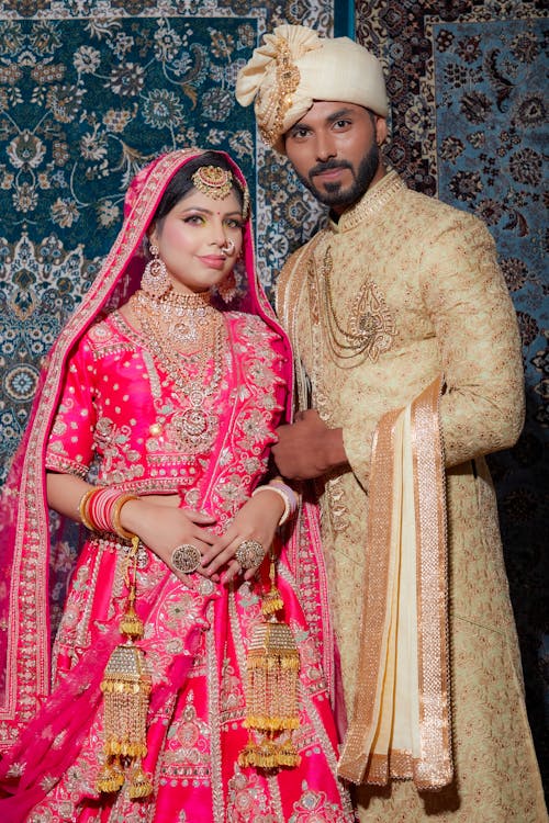 Smiling Couple in Traditional Wedding Costumes