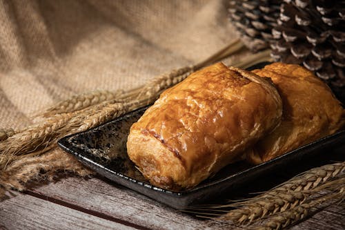 Free Bread on Black  Ceramic Plate Stock Photo