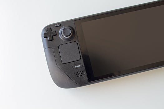 High-resolution image of a handheld gaming console on a white background.