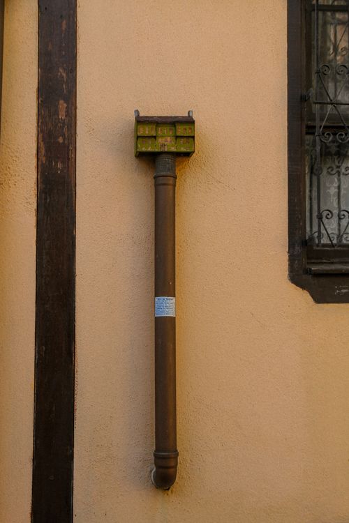 Gutter near Post on Wall · Free Stock Photo