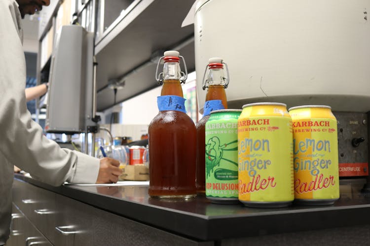 Two Yellow Lemon And Ginger Soda Cans