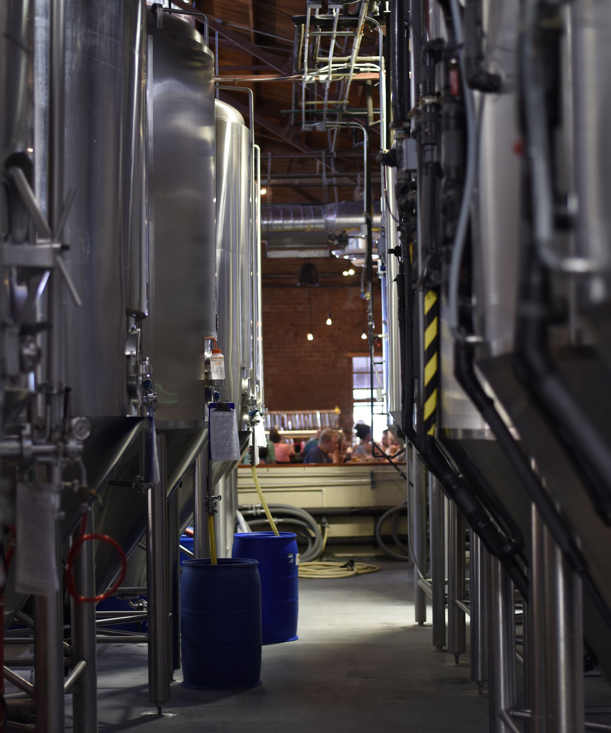 Beer being poured at a craft brewery