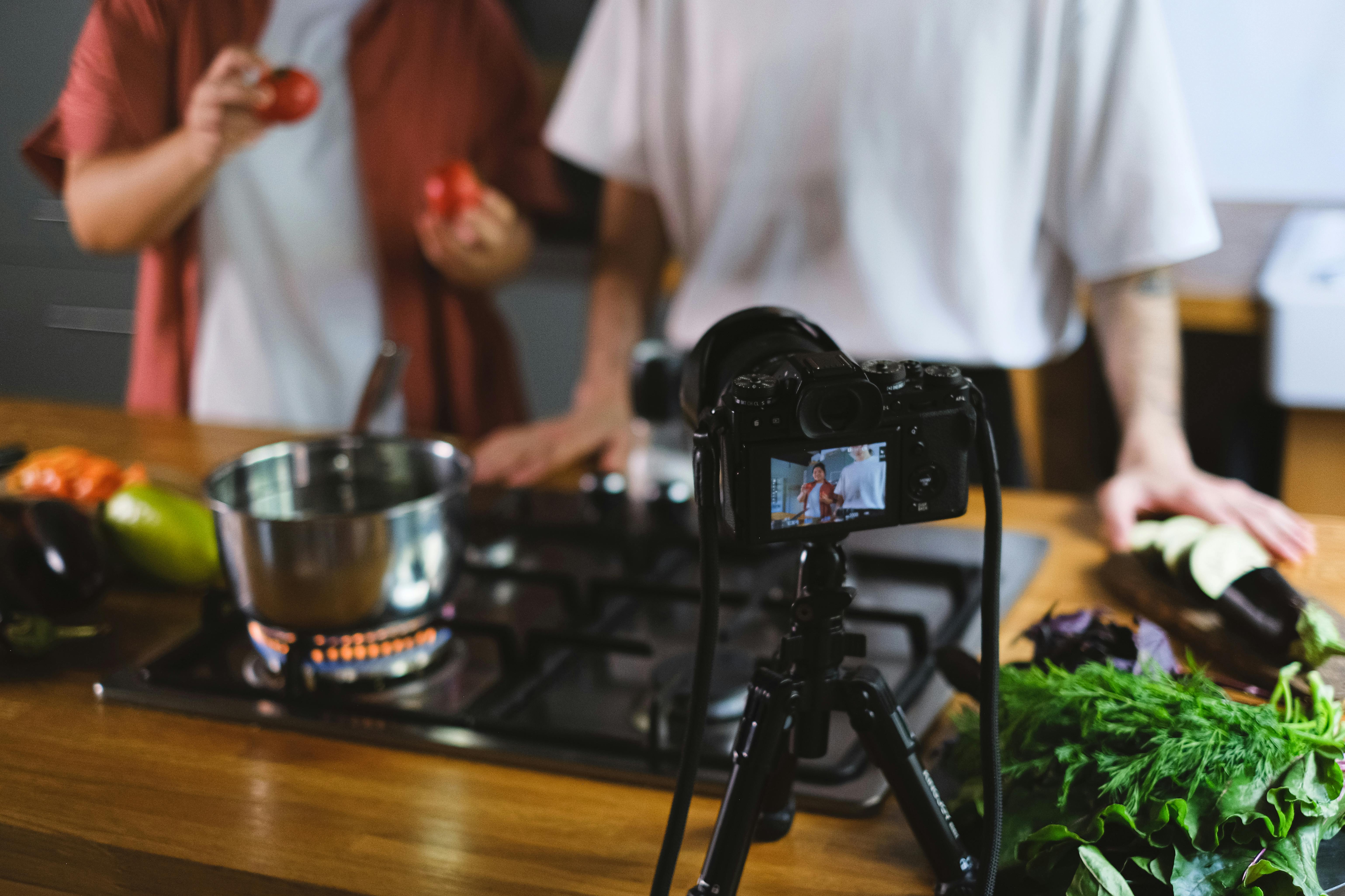 Men Filming Cooking Vlog · Free Stock Photo