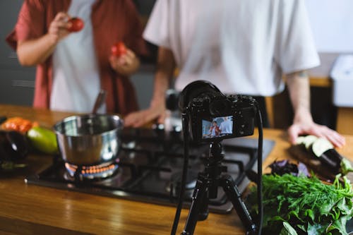 Men Filming Cooking Vlog