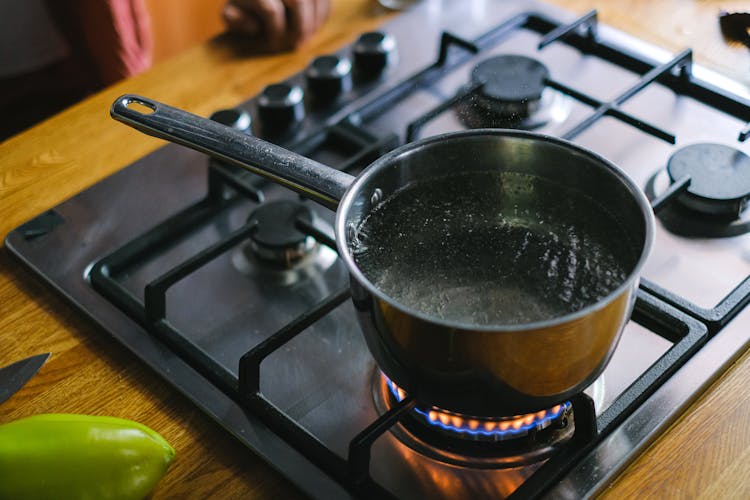 Boiling Water In Pot On Burner