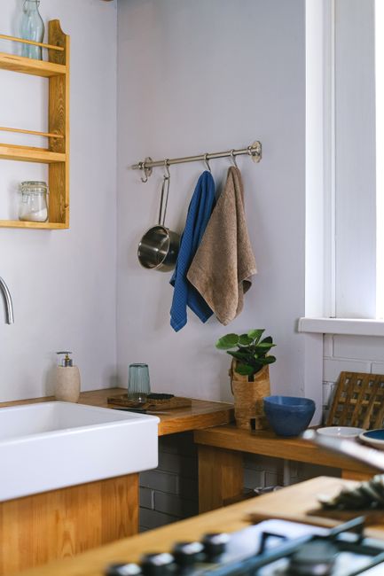 towel hanging on rail near sink
