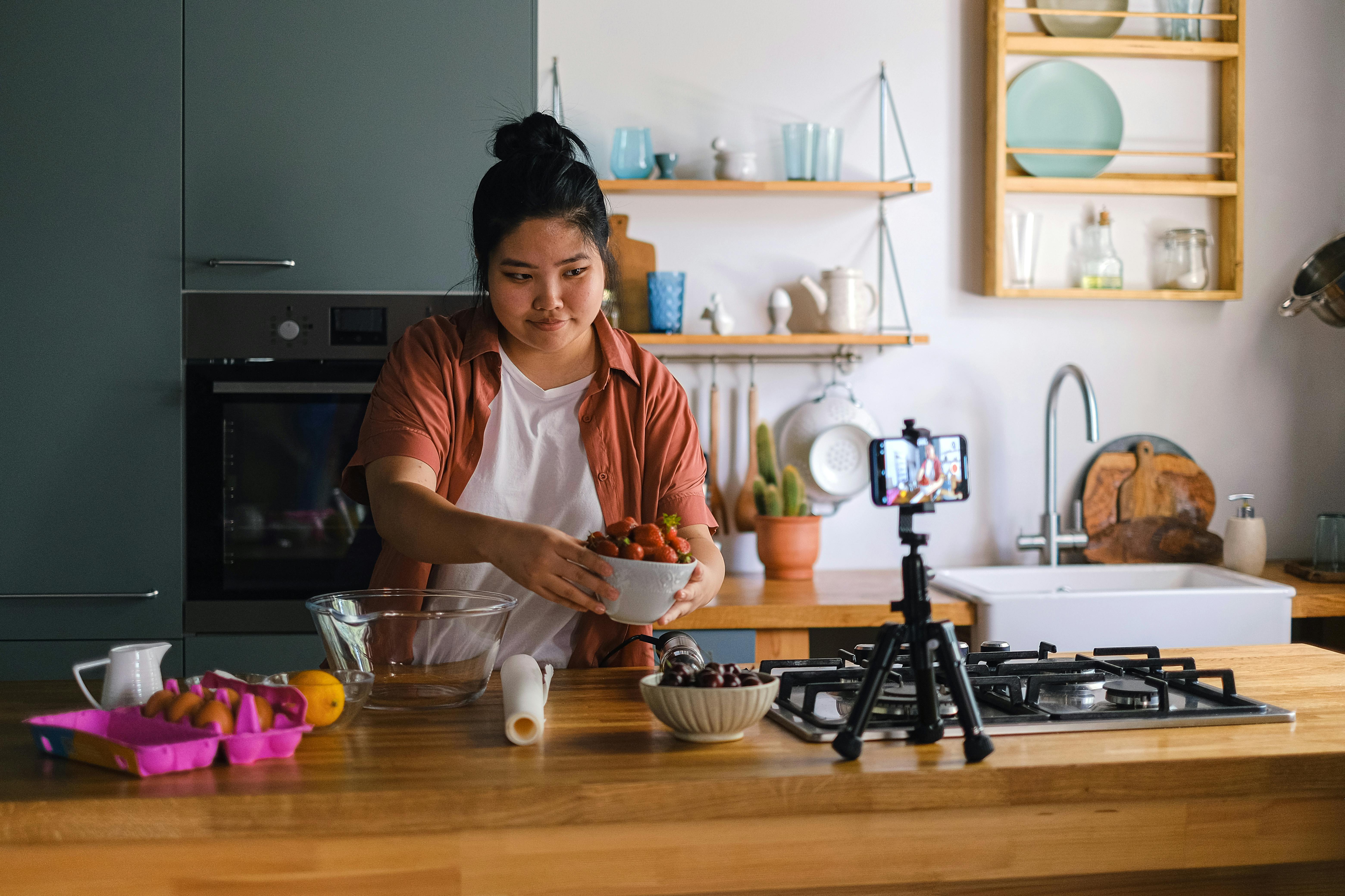 Woman Cooking in Outdoor Kitchen · Free Stock Photo