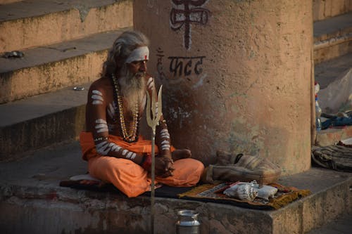 Sadhu Sitting in Front of a Temple 