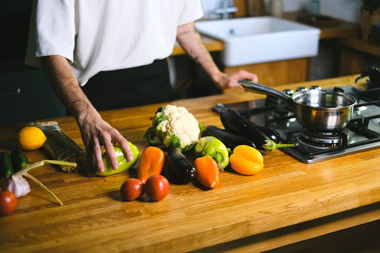 A Person Holding Vegetables