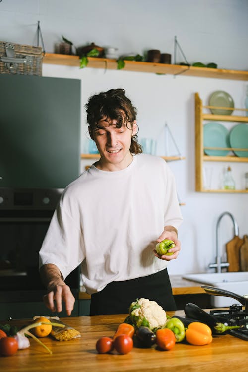 Free A Man Holding Vegetables Stock Photo