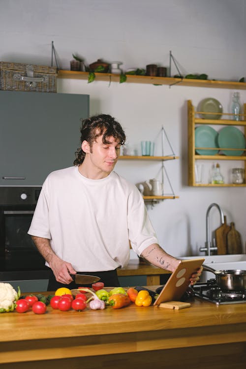 Free A Man Holding Vegetables Stock Photo