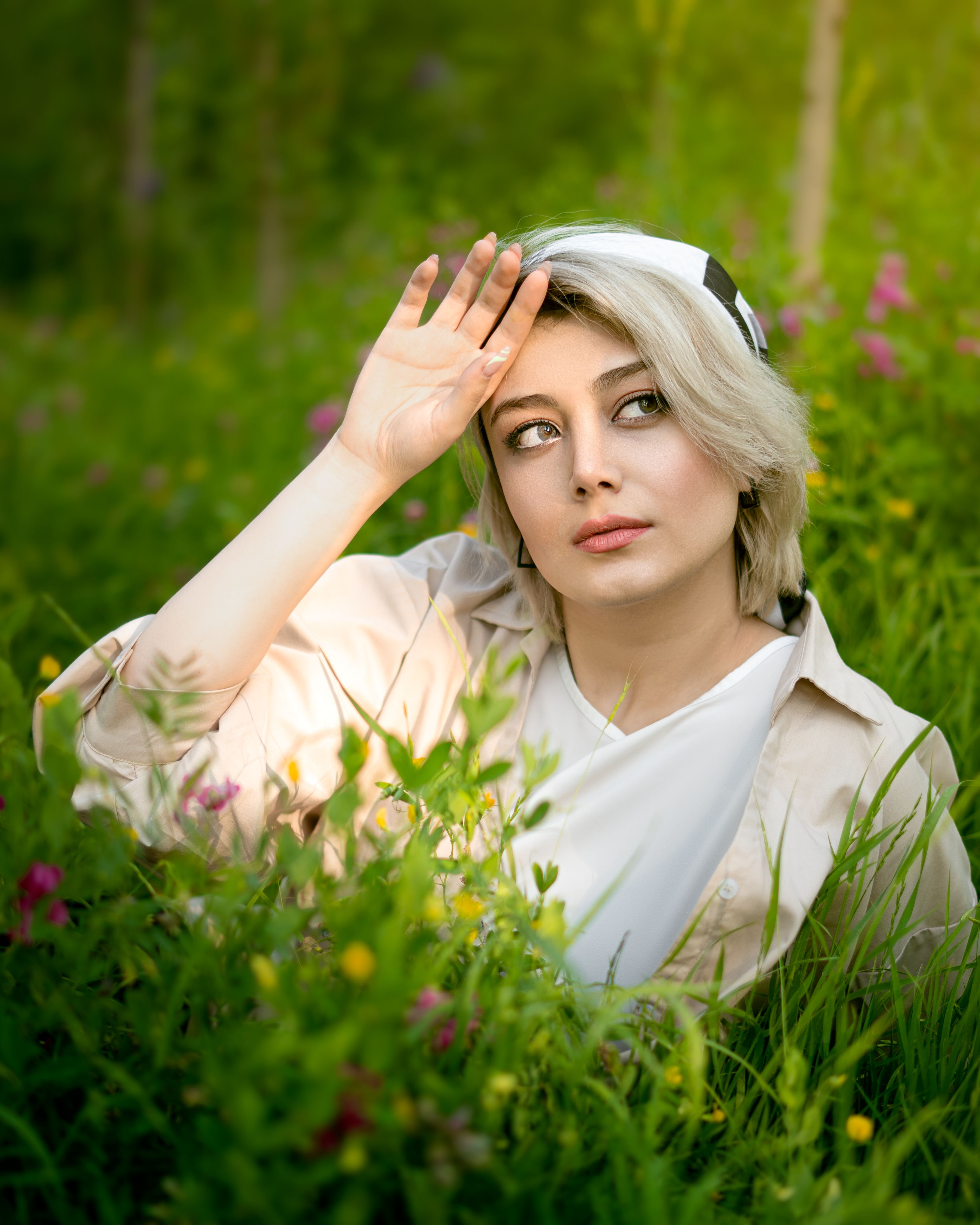 Woman Posing with Her Hand Near Her Forehead · Free Stock Photo