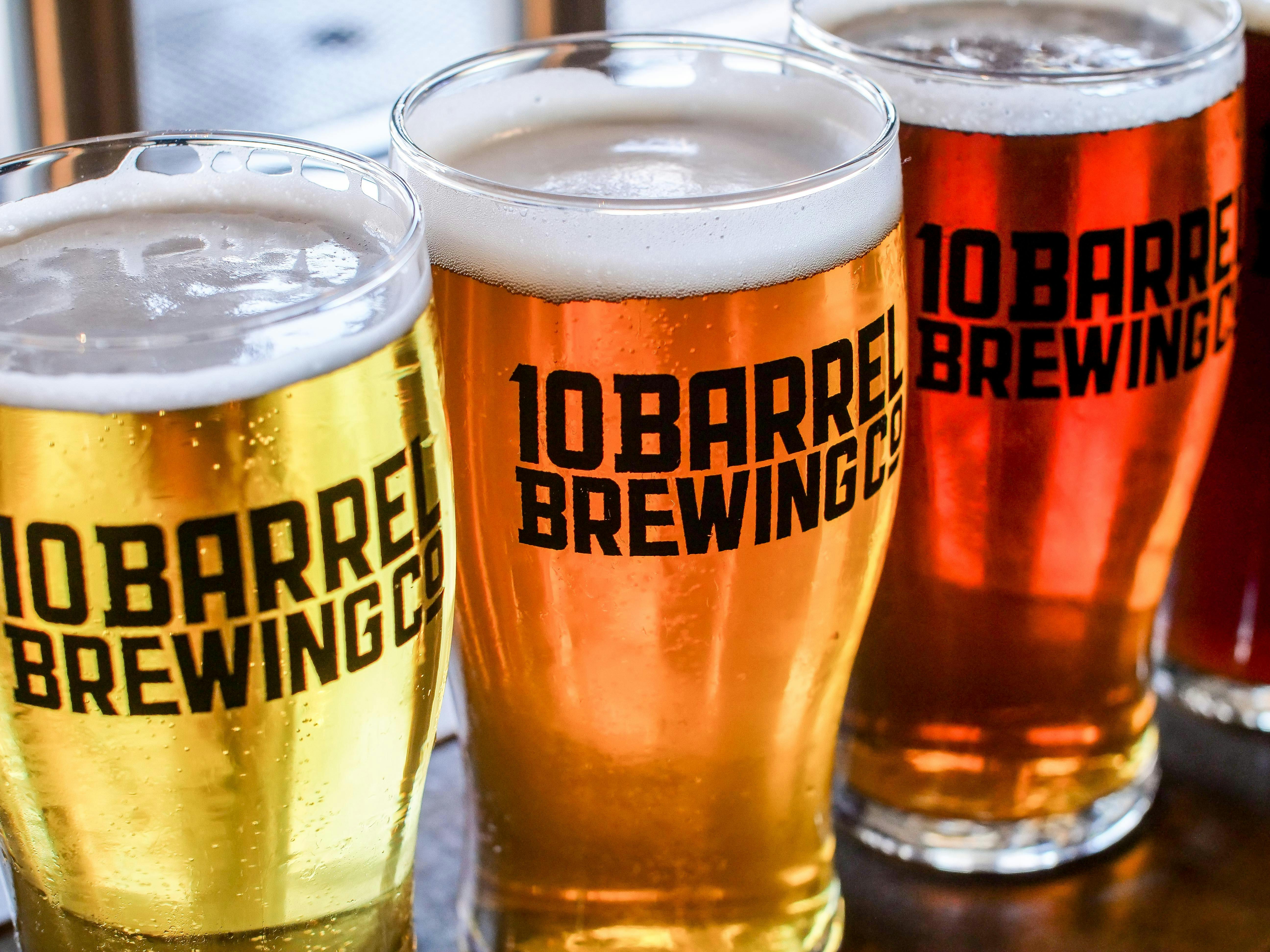 Three 10 Barrel Brewing Glasses Full of Beer · Free Stock Photo